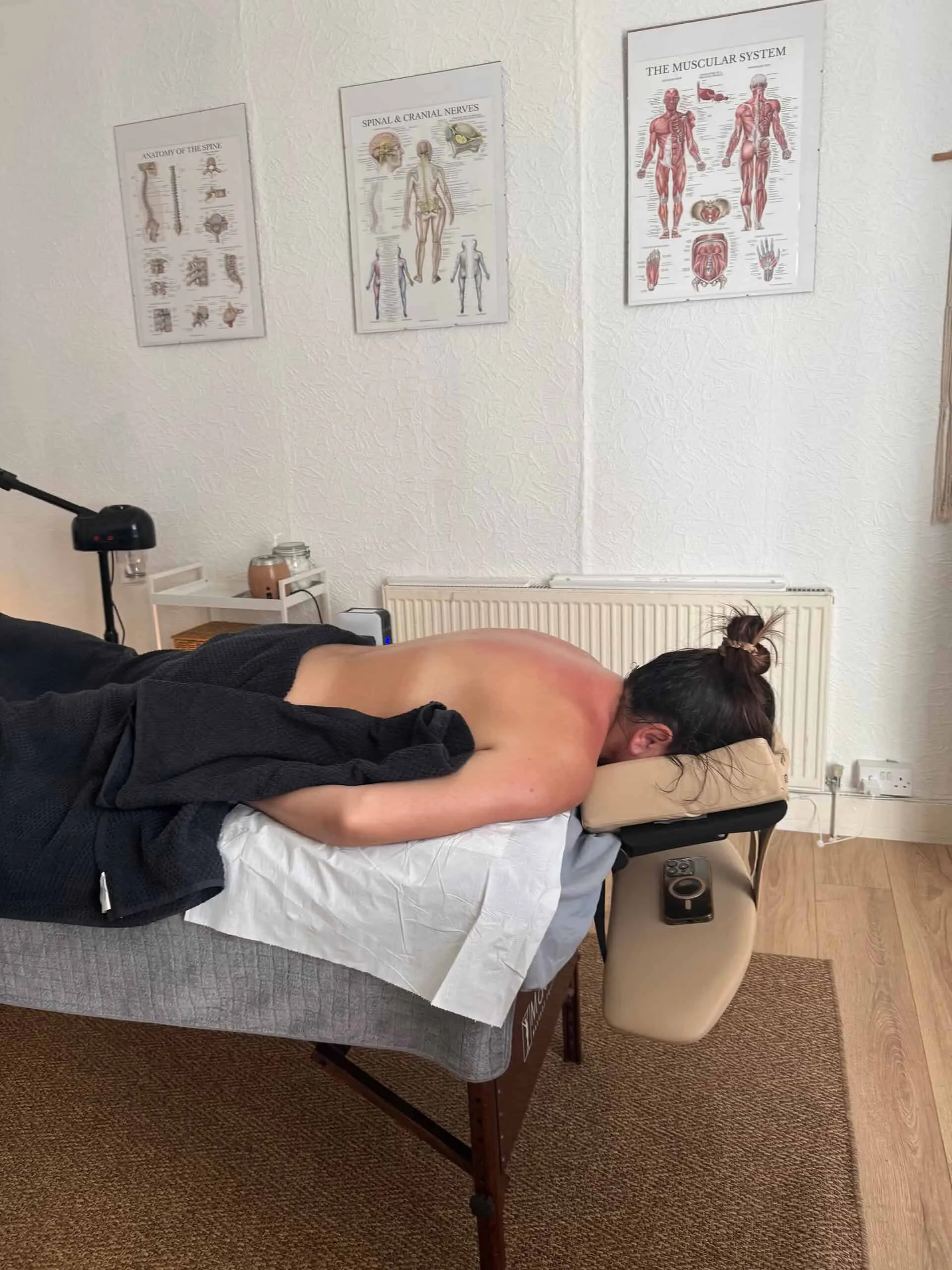 Deep tissue treatment in progress at Roma Sports Therapy, Prescot